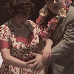 Christine Duncan as the mother and Peter McGillivray as the expectant father in 1950s costume in the opera Shelter